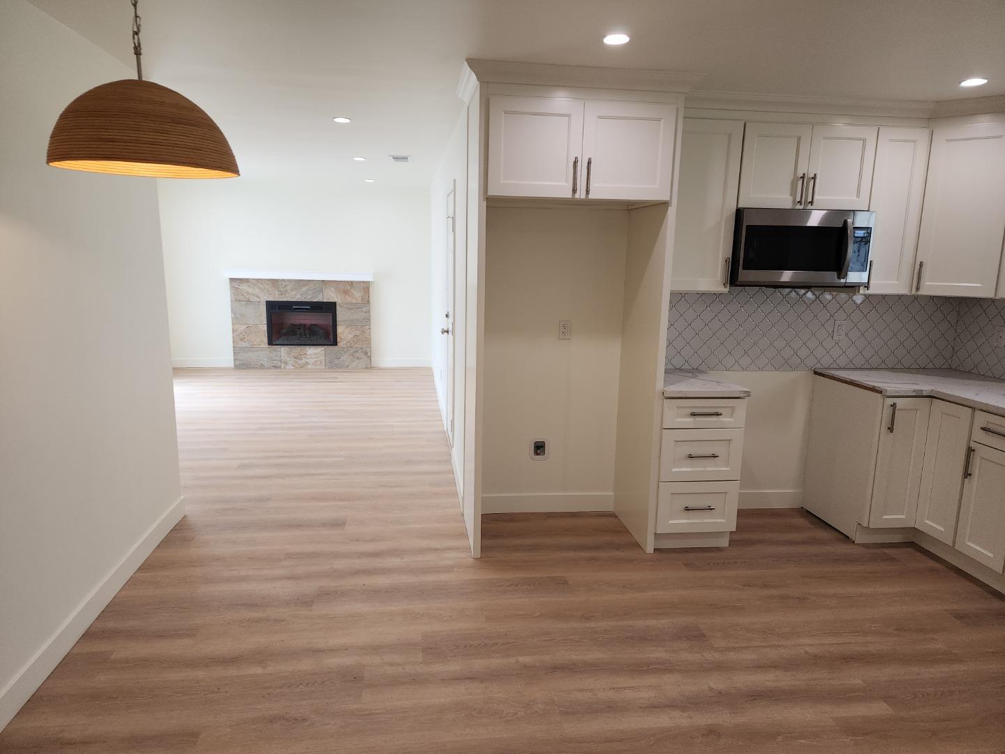 3280 Cheyenne Drive Merced, CA 95348 - Photo 16 of 34 a kitchen with stainless steel appliances a refrigerator stove and cabinets