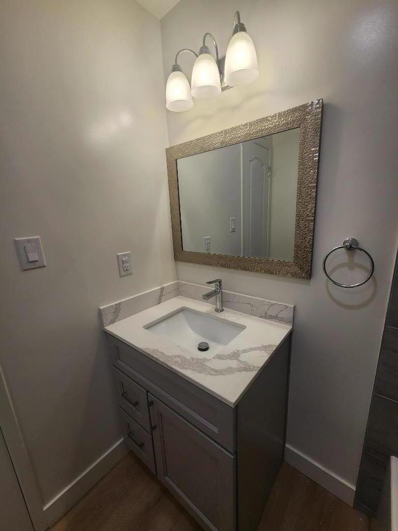 3280 Cheyenne Drive Merced, CA 95348 - Photo 20 of 34 a bathroom with a toilet sink and mirror