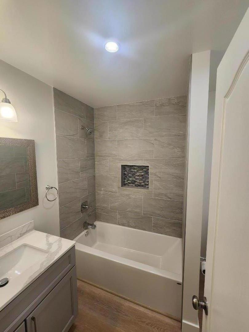 3280 Cheyenne Drive Merced, CA 95348 - Photo 22 of 34 a bathroom with a granite countertop sink a toilet and bathtub