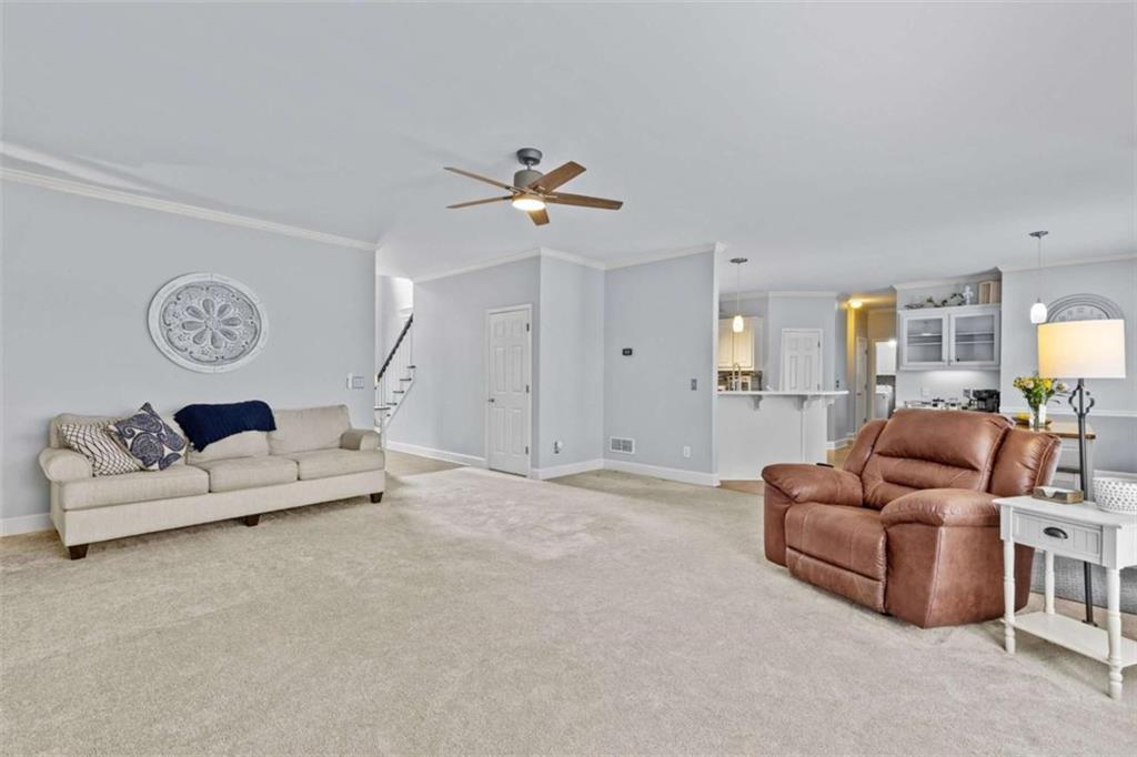 1148 Maple Creek Ridge Loganville, GA 30052 - Photo 11 of 46 a living room with furniture