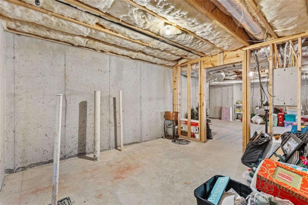 1148 Maple Creek Ridge Loganville, GA 30052 - Photo 39 of 46 a view of a room with gym equipment