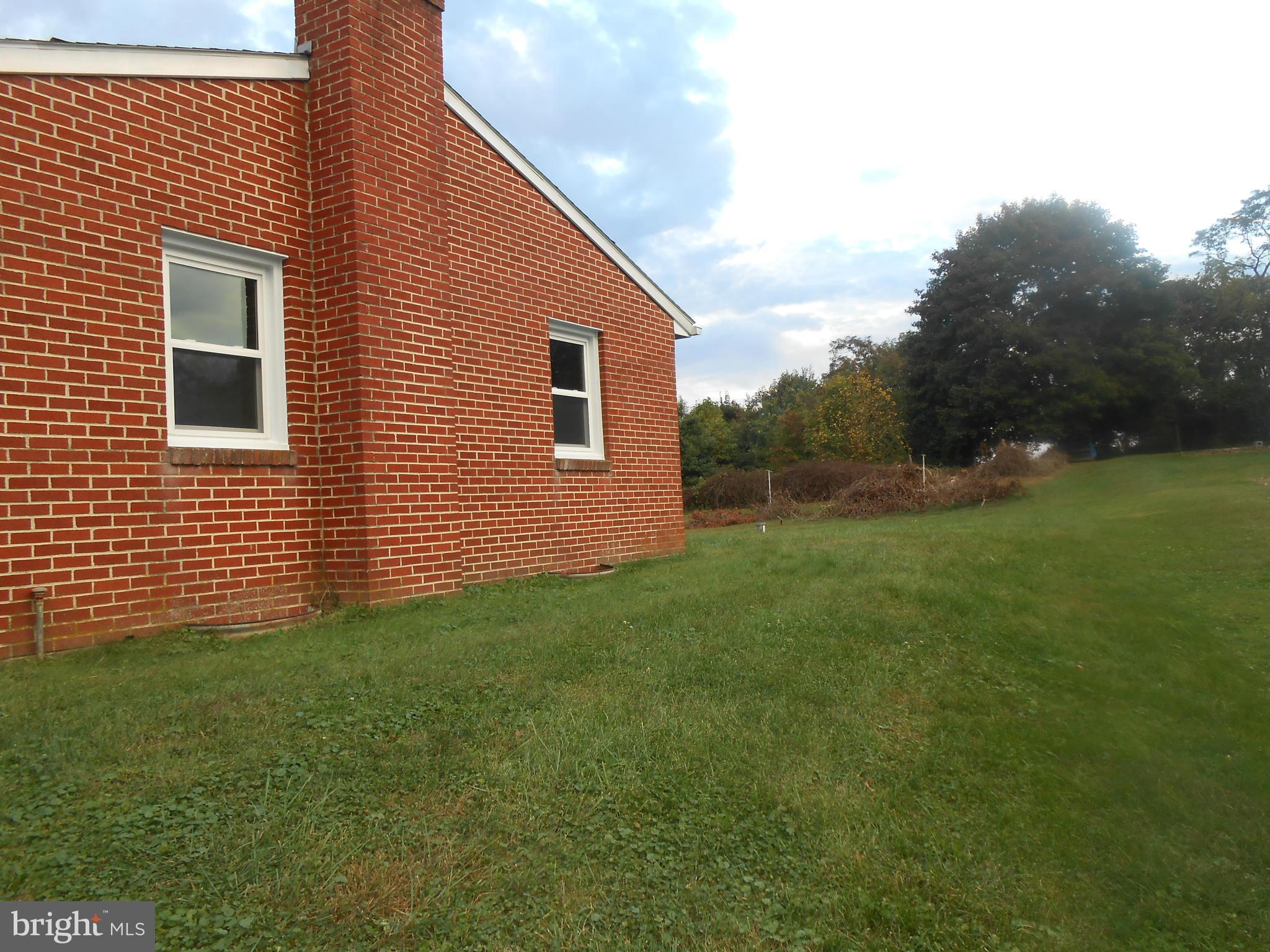 6212 Appletown Road Boonsboro, MD 21713 - Photo 15 of 19 ALL BRICK construction - side yard of house