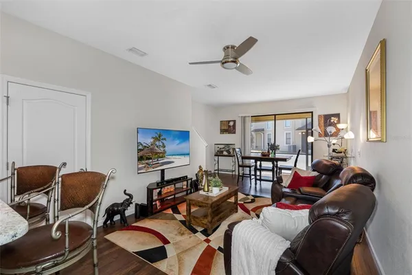 a living room with furniture and a window