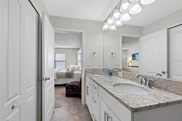 a view of storage and utility room with washer and dryer
