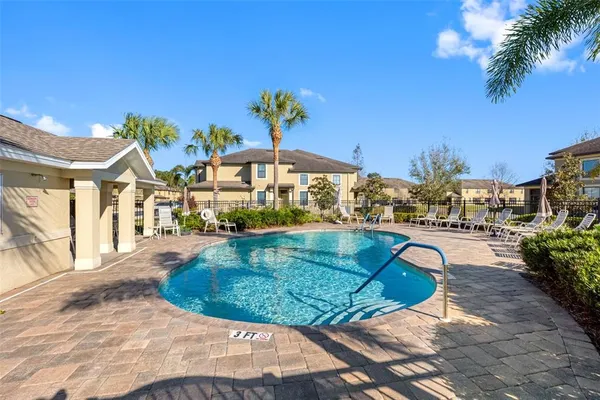 a view of a house with swimming pool