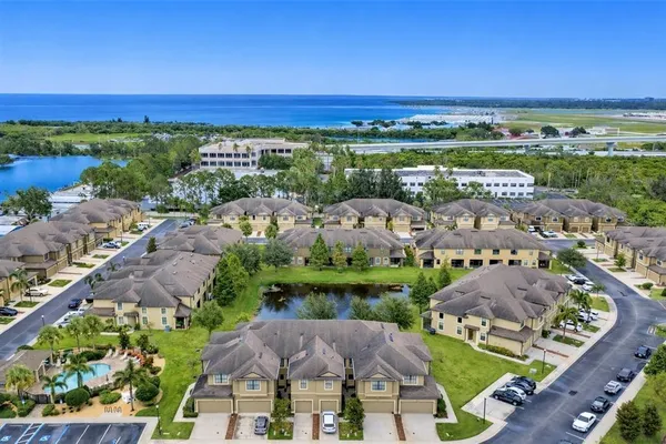 an aerial view of a house with outdoor space