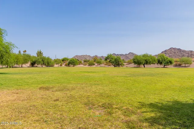a view of an ocean and a mountain