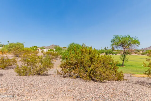 a view of a house with swimming pool