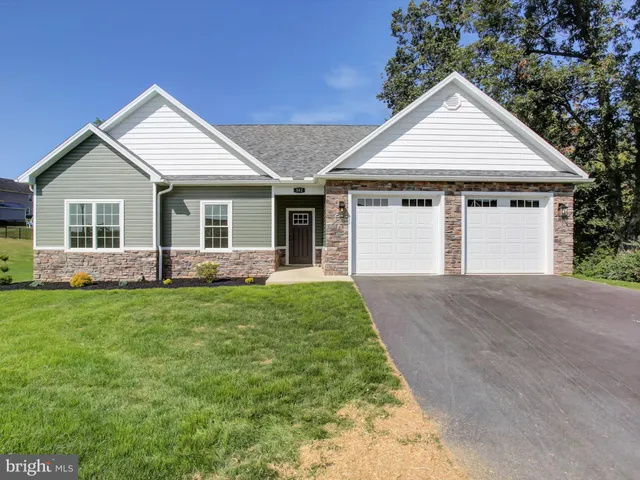 front view of a house and a yard