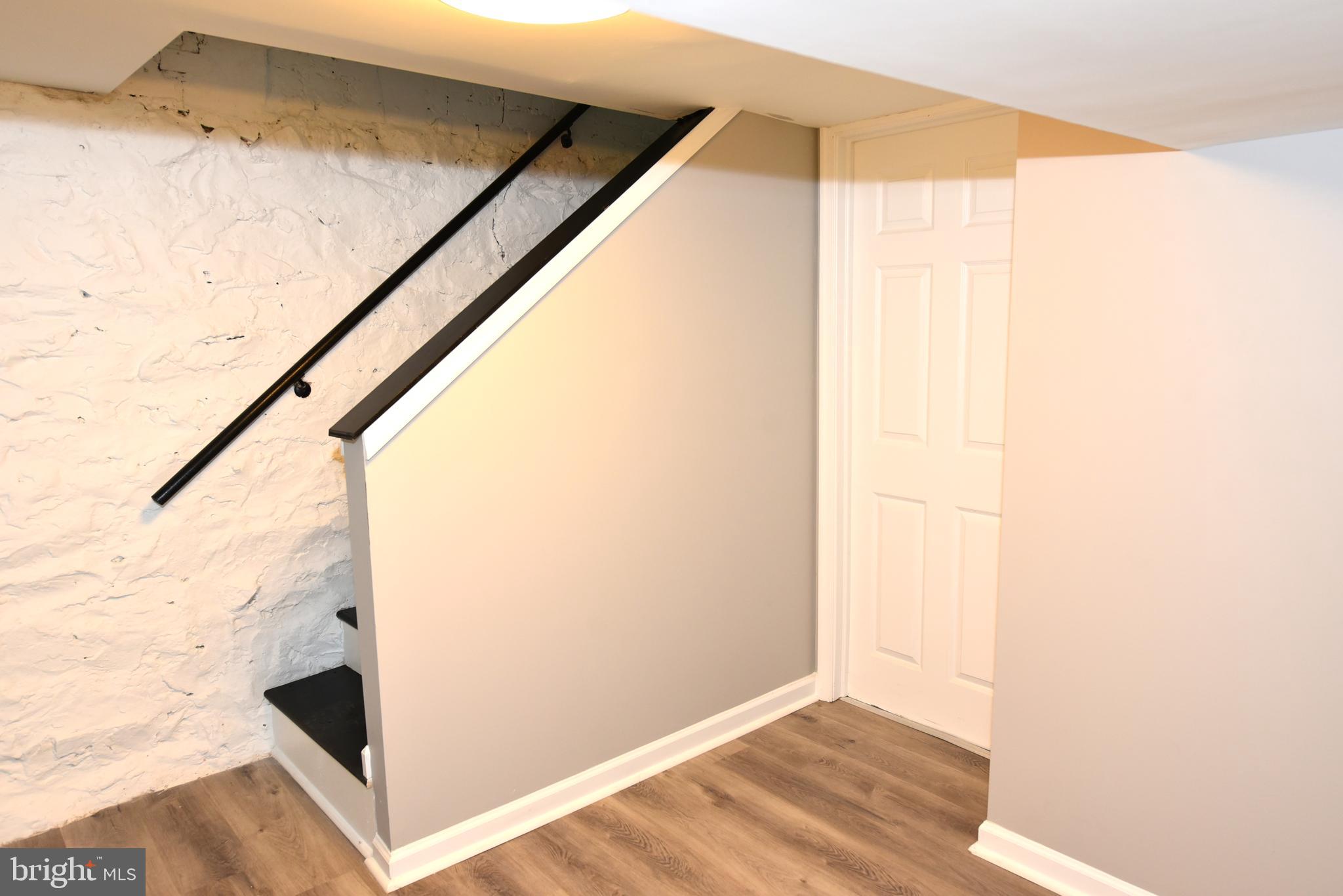 2225 West Baltimore Street Baltimore, MD 21223 - Photo 40 of 46 a view of hallway with stairs