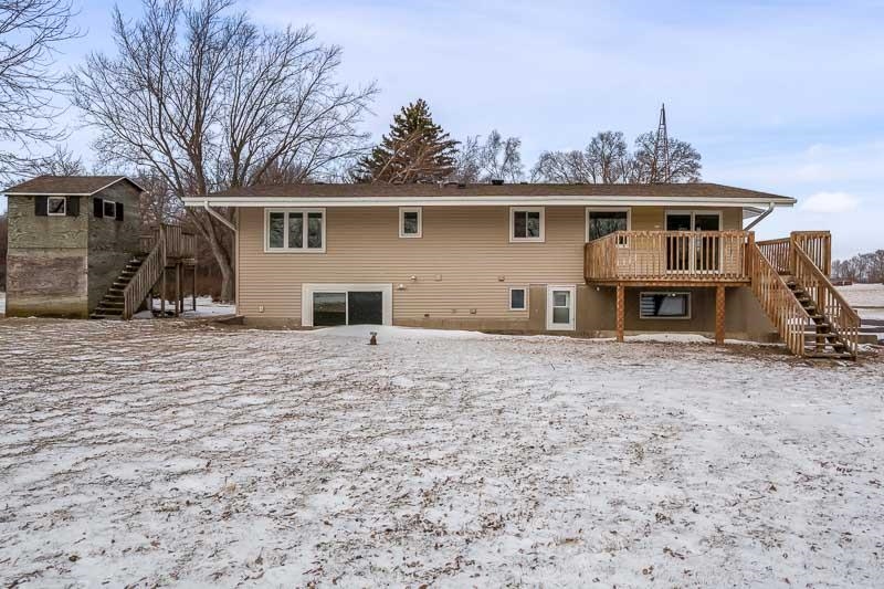 8611 Huber Road Belvidere, IL 61008 - Photo 15 of 79 a view of a house with a yard and roof deck