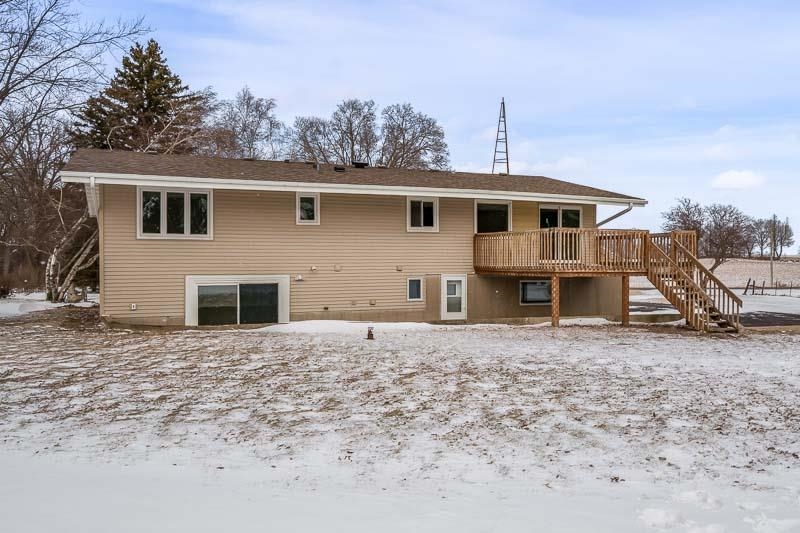 8611 Huber Road Belvidere, IL 61008 - Photo 16 of 79 a front view of a house with a yard