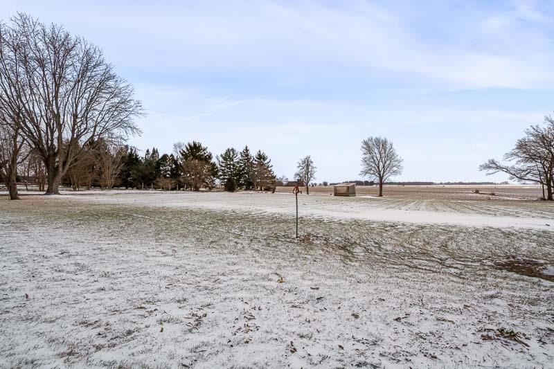 8611 Huber Road Belvidere, IL 61008 - Photo 19 of 79 a view of a dry yard with trees