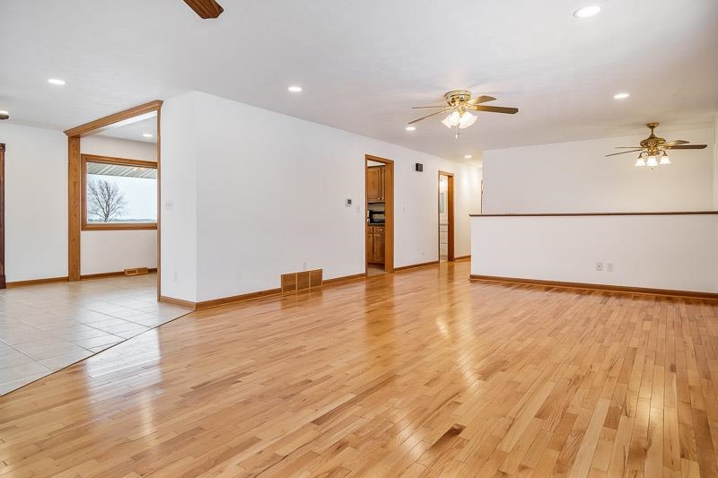 8611 Huber Road Belvidere, IL 61008 - Photo 31 of 79 a view of a livingroom with a ceiling fan
