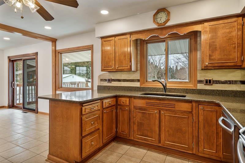 8611 Huber Road Belvidere, IL 61008 - Photo 44 of 79 a kitchen with a sink window and cabinets