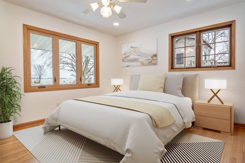 8611 Huber Road Belvidere, IL 61008 - Photo 49 of 79 a bedroom with a large bed and a window