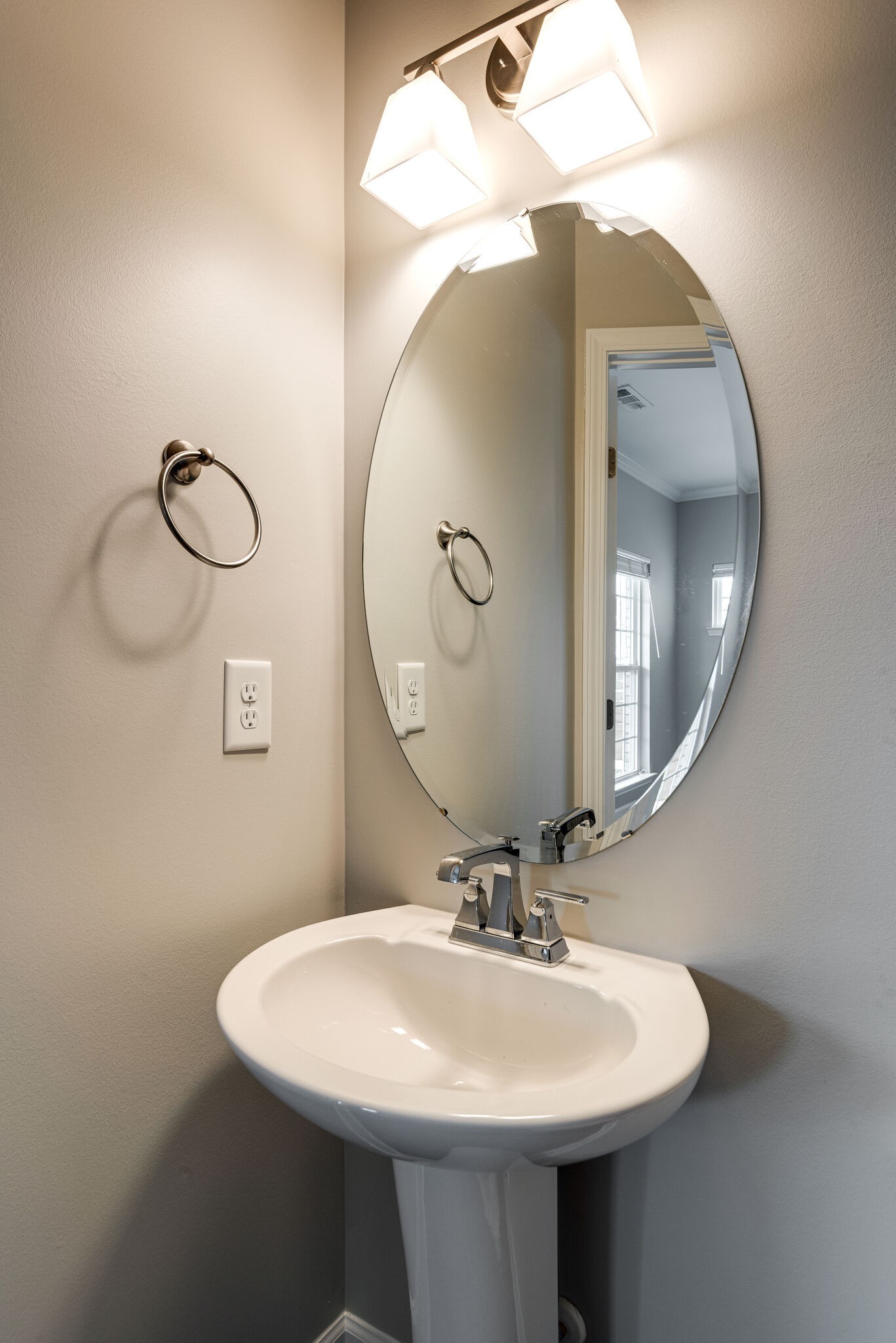 269 Mary Ann Circle Spring Hill, TN 37174 - Photo 19 of 28 a bathroom with a sink and mirror