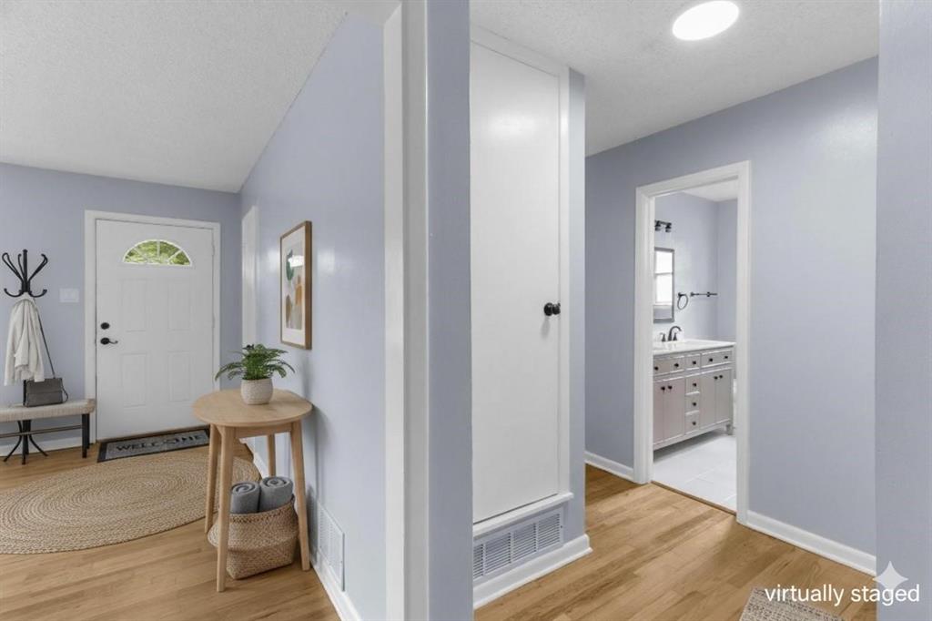 1818 Belden Street Sherman, TX 75092 - Photo 7 of 28 a view of livingroom with furniture and wooden floor