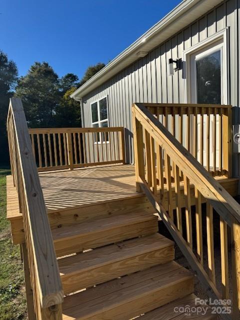113 Keeter Street Grover, NC 28073 - Photo 3 of 6 a view of staircase with railing and white walls