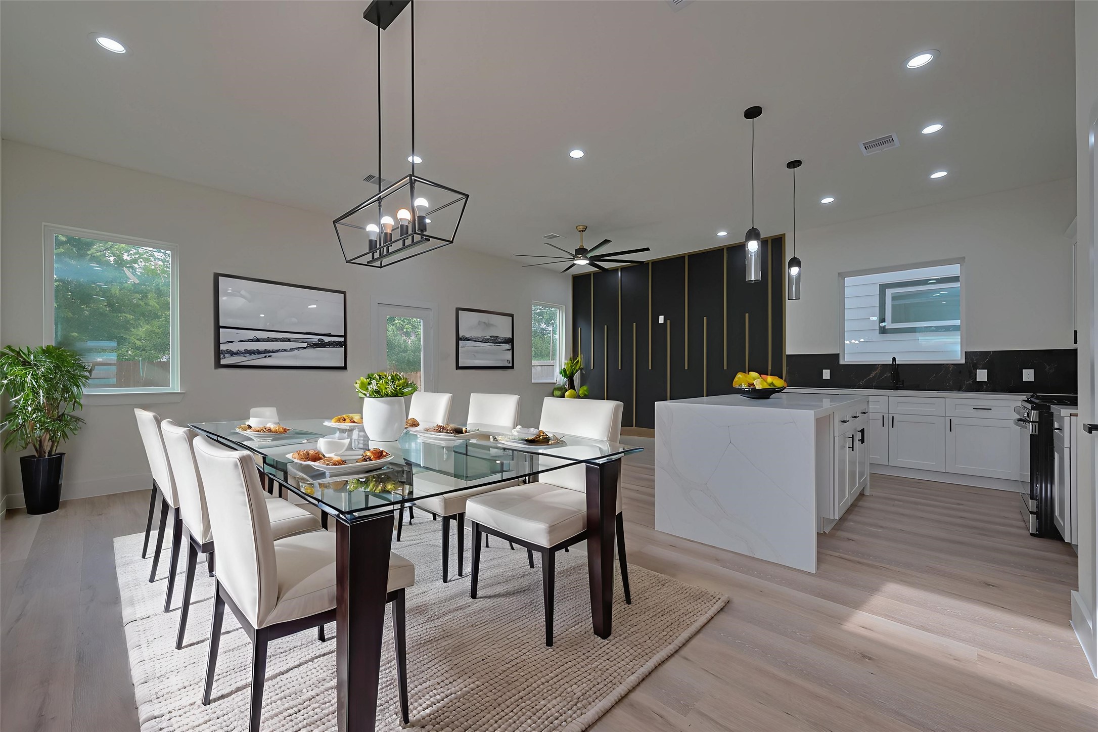 2422 Dalview Street Houston, TX 77091 - Photo 2 of 24 Enjoy the seamless flow of the
kitchen and dining area, designed
with entertaining and daily life in
mind. Pendant and chandelier
lighting provide distinct style zones
while maintaining a connected, open
vibe ideal for modern living. - This
room has been virtually staged.