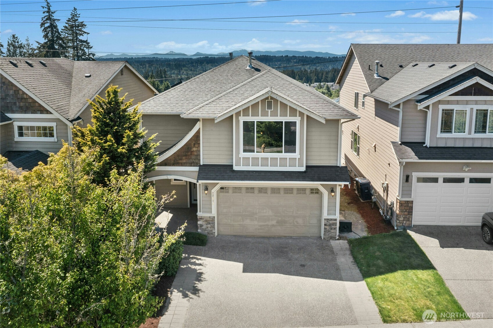 22624 43rd Drive Southeast Bothell, WA 98021 - Photo 31 of 36 a front view of a house with a yard