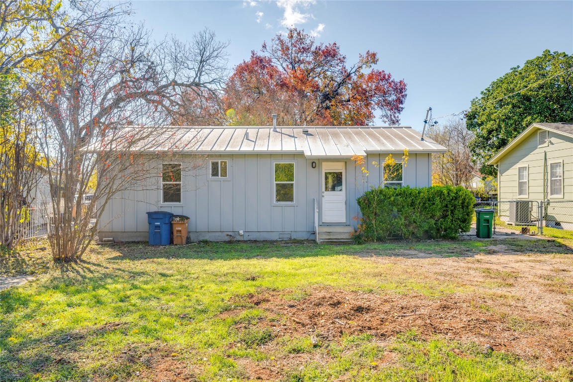 4804 Tanney Street Austin, TX 78721 - Photo 11 of 35 a view of a house with a big yard and potted plants