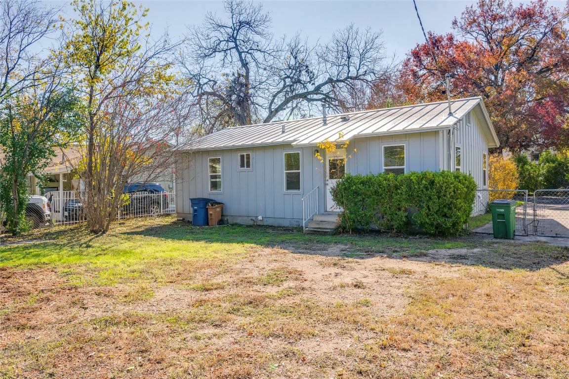 4804 Tanney Street Austin, TX 78721 - Photo 12 of 35 a view of a house with a yard and large tree