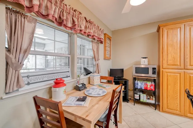 a view of a dining room with furniture window and entryway