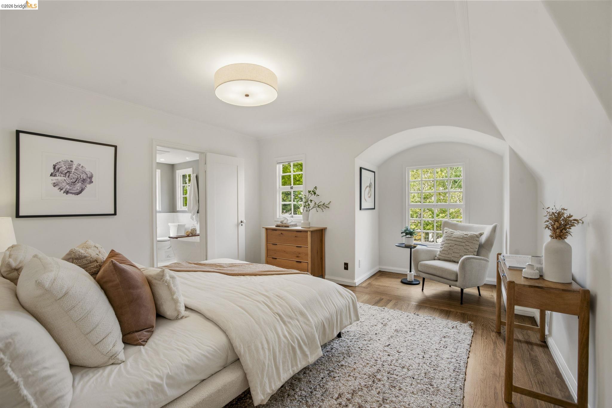 1087 Hubert Road Oakland, CA 94610 - Photo 20 of 67 Hardwood-style flooring throughout with a textured area rug