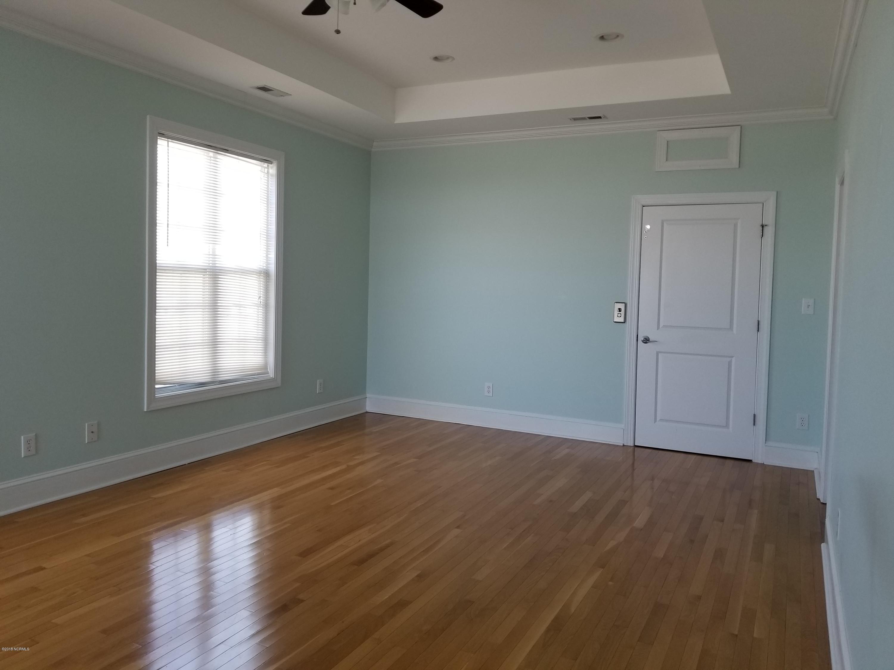 1502 East Fort Macon Road, Unit WEST Atlantic Beach, NC 28512 - Photo 10 of 13 Master bedroom
