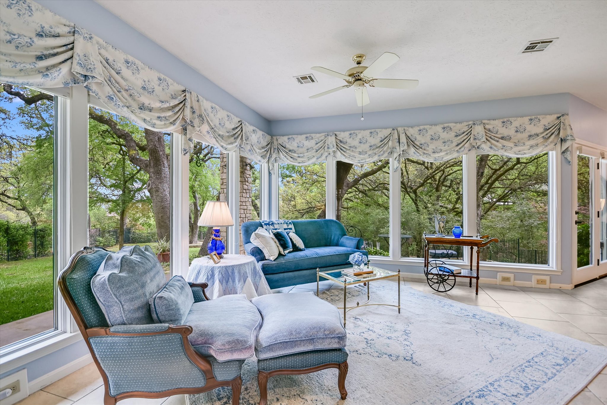 3901 Prentice Lane Austin, TX 78746 - Photo 12 of 40 A private sitting area creates a relaxing retreat within the suite.