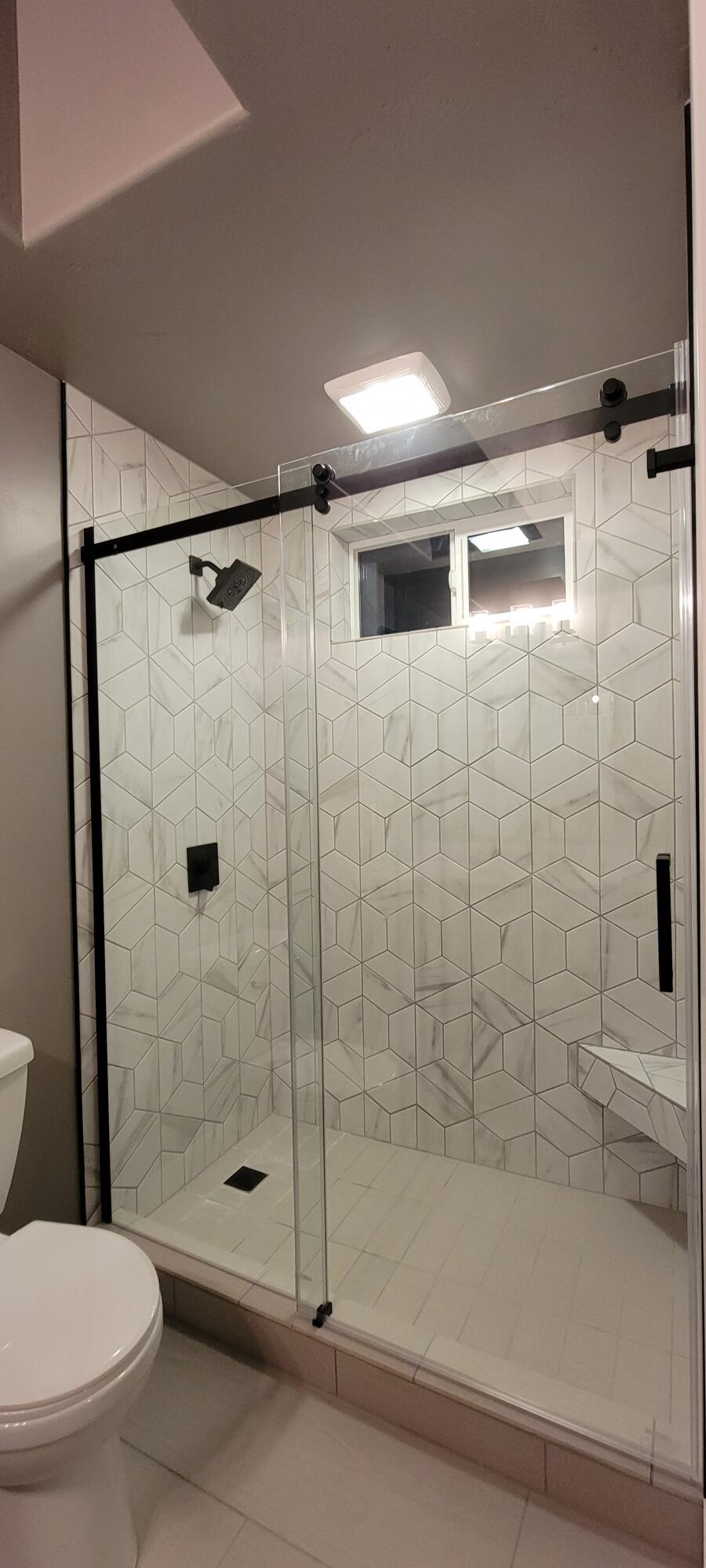 19263 Indian Summer Road Bend, OR 97702 - Photo 30 of 32 a bathroom with a shower and a toilet