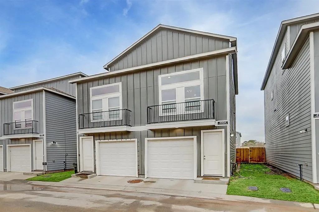 4906 Paradigm Ln Spring Spring, TX 77379 - Photo 14 of 17 Welcome to 4906 Paradigm! This townhome is located on the right side of the featured picture.