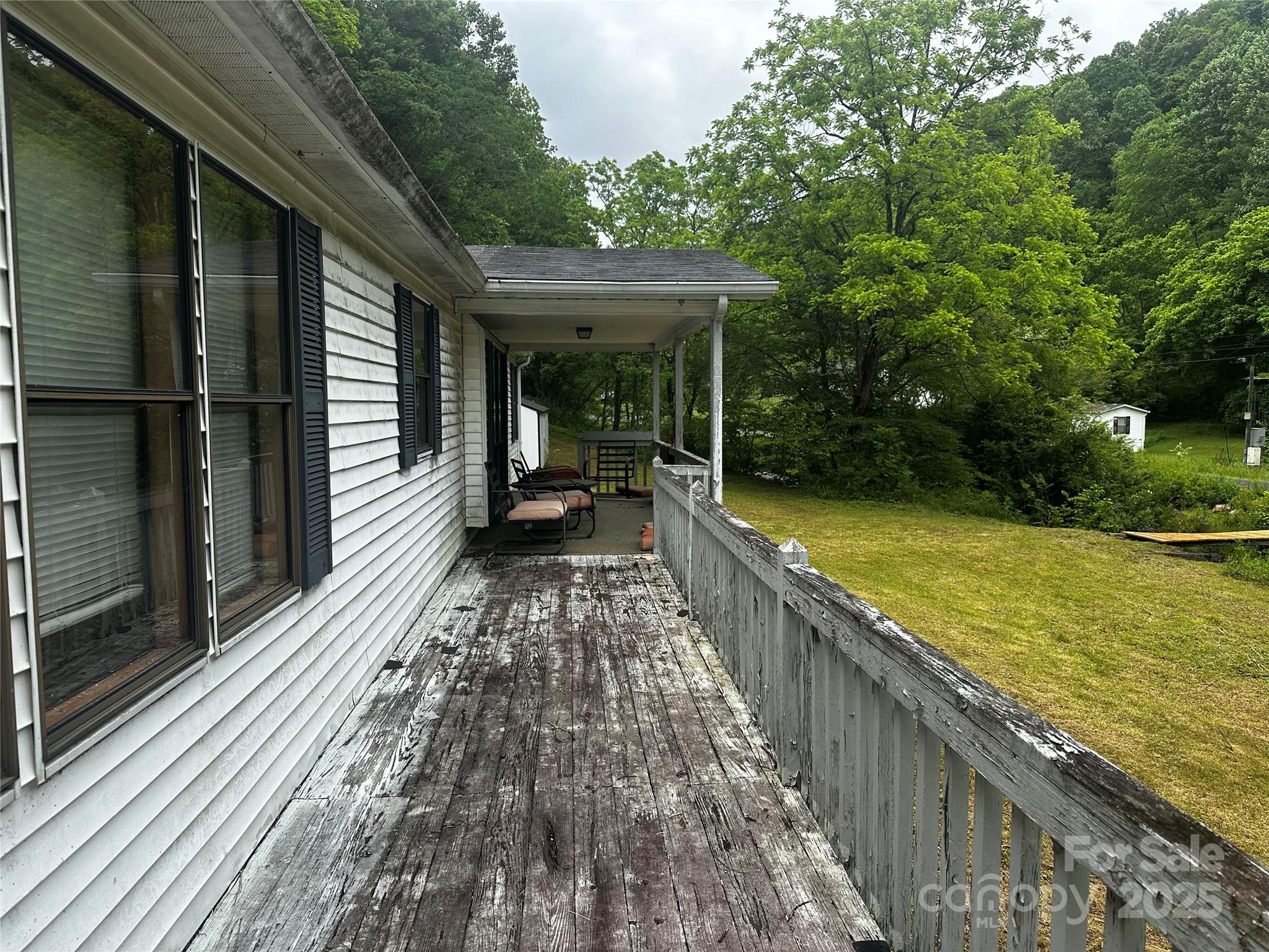 731 Pigeon Roost Road Green Mountain, NC 28740 - Photo 18 of 31 a view of swimming pool with a patio