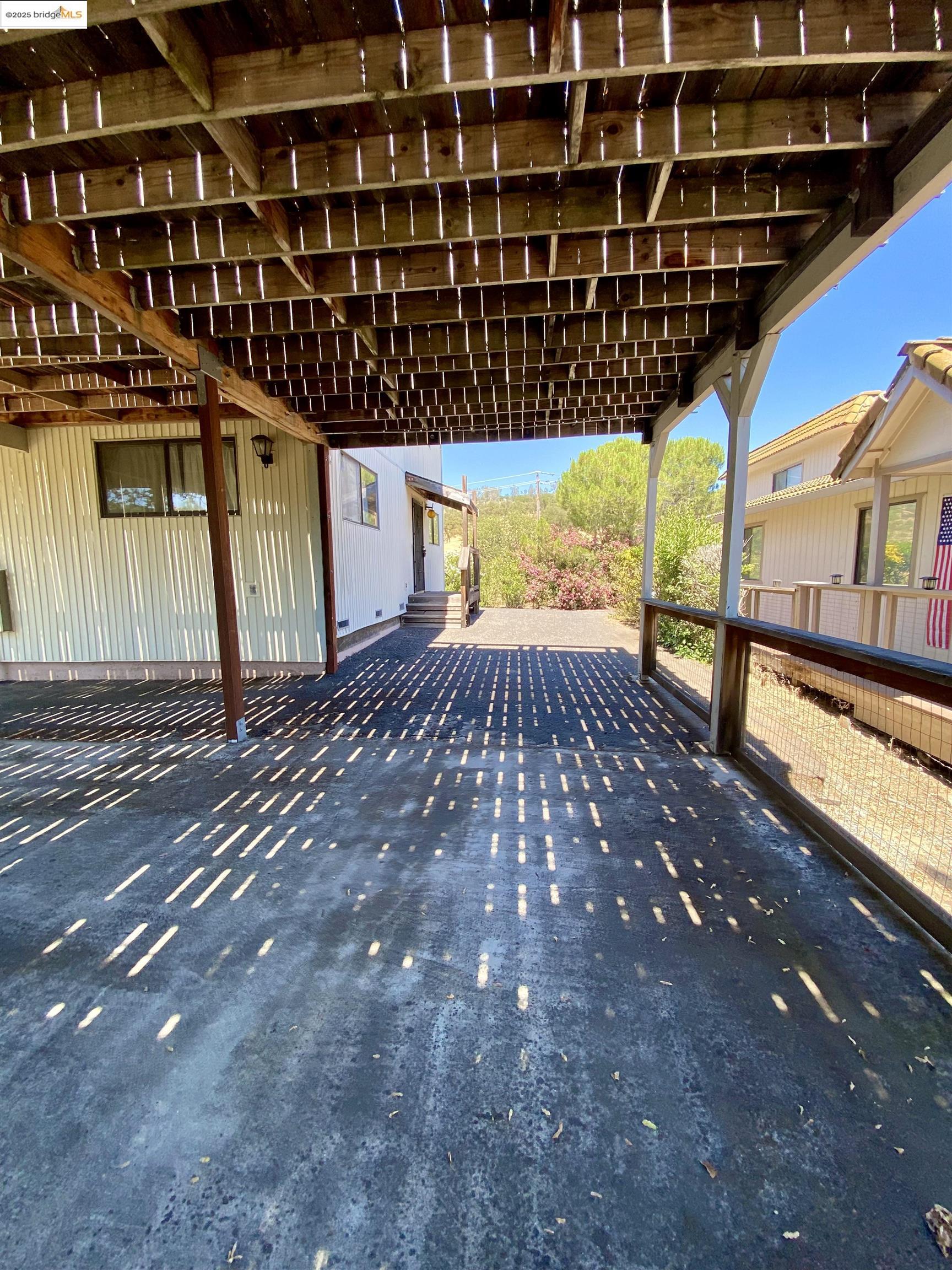 75 Poker Flat Road Copperopolis, CA 95228 - Photo 14 of 50 a view of a building with a porch