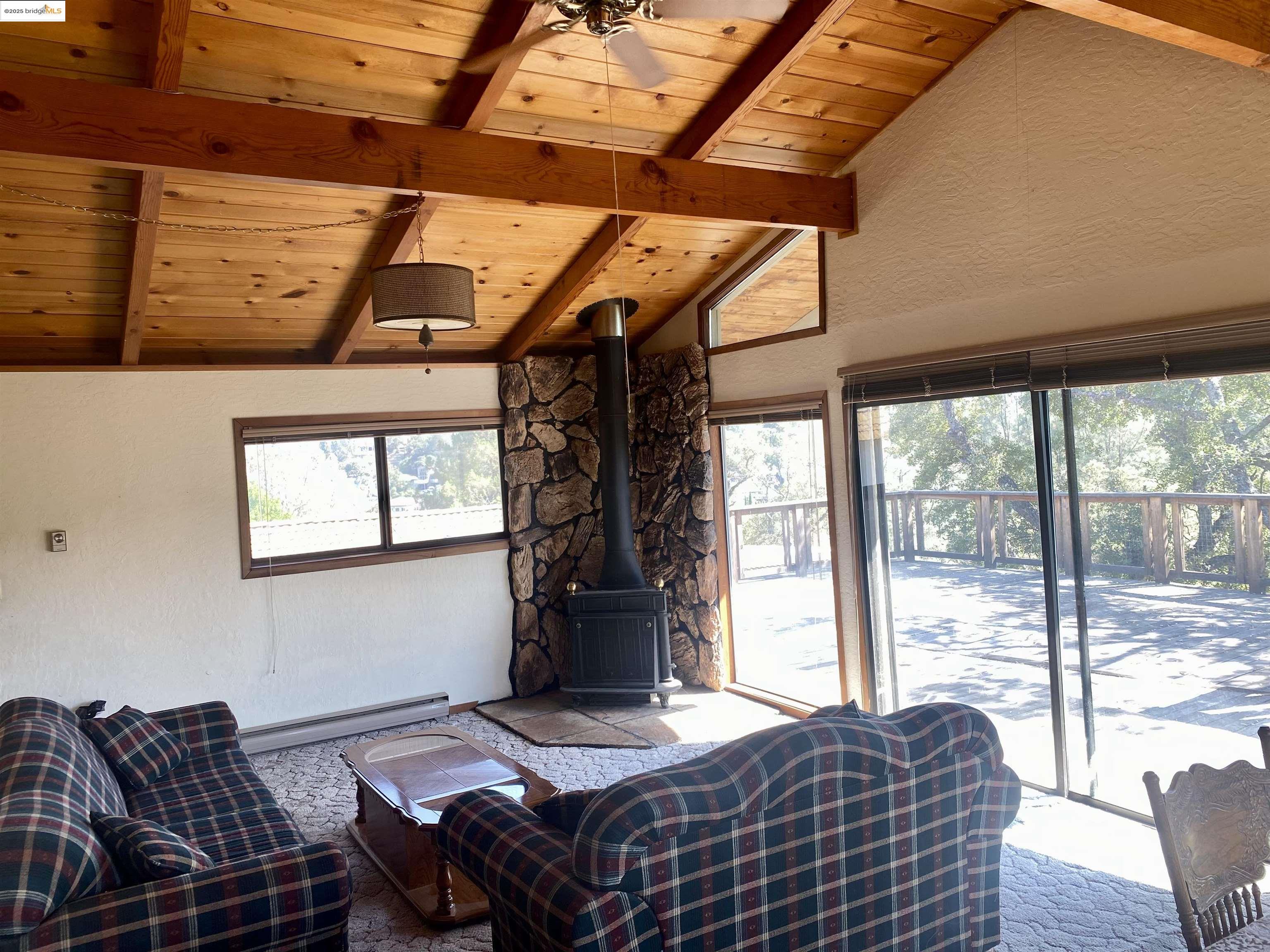 75 Poker Flat Road Copperopolis, CA 95228 - Photo 16 of 50 a bedroom with furniture and a window