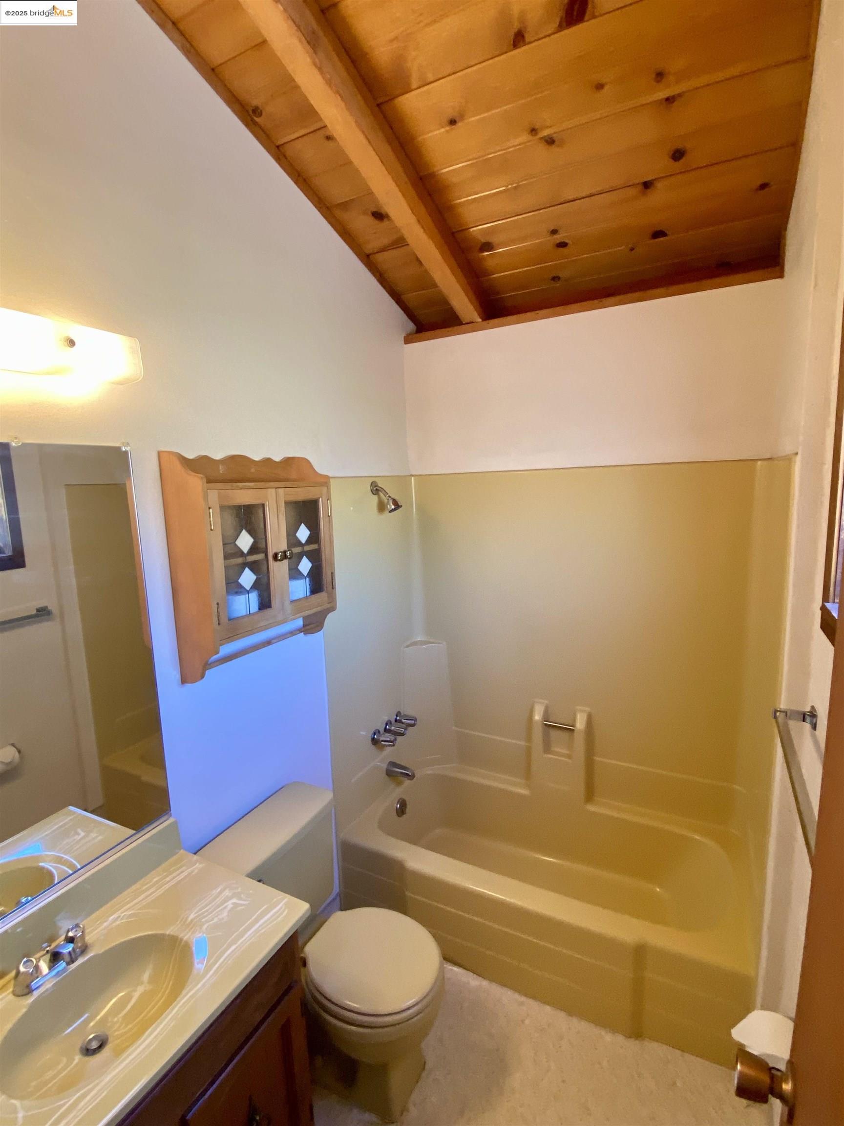 75 Poker Flat Road Copperopolis, CA 95228 - Photo 21 of 50 a bathroom with a sink a toilet and bathtub