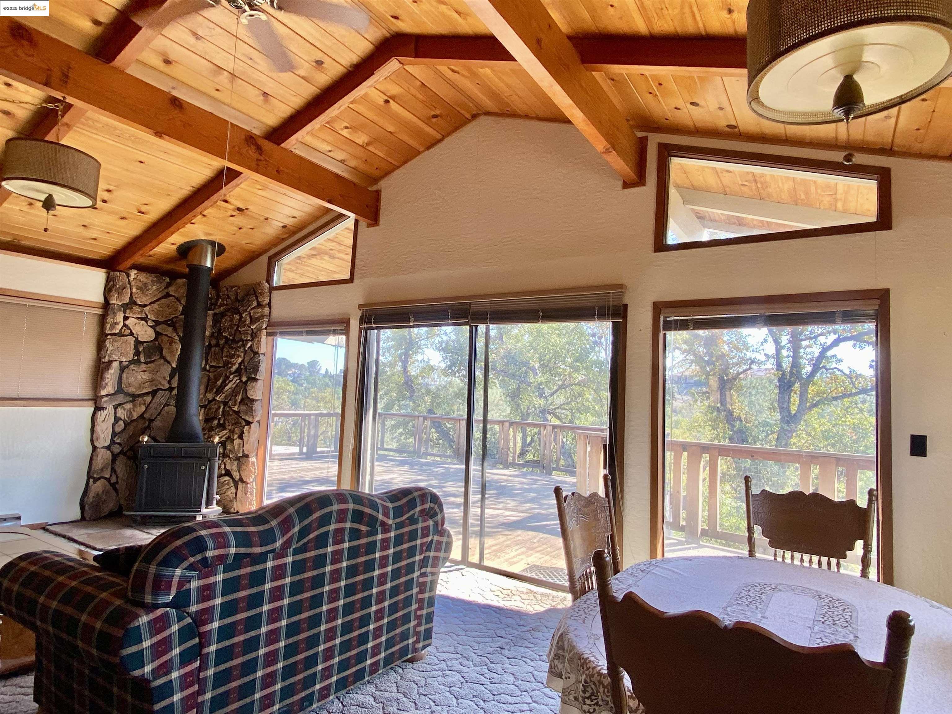 75 Poker Flat Road Copperopolis, CA 95228 - Photo 27 of 50 a bedroom with a bed and wooden floor