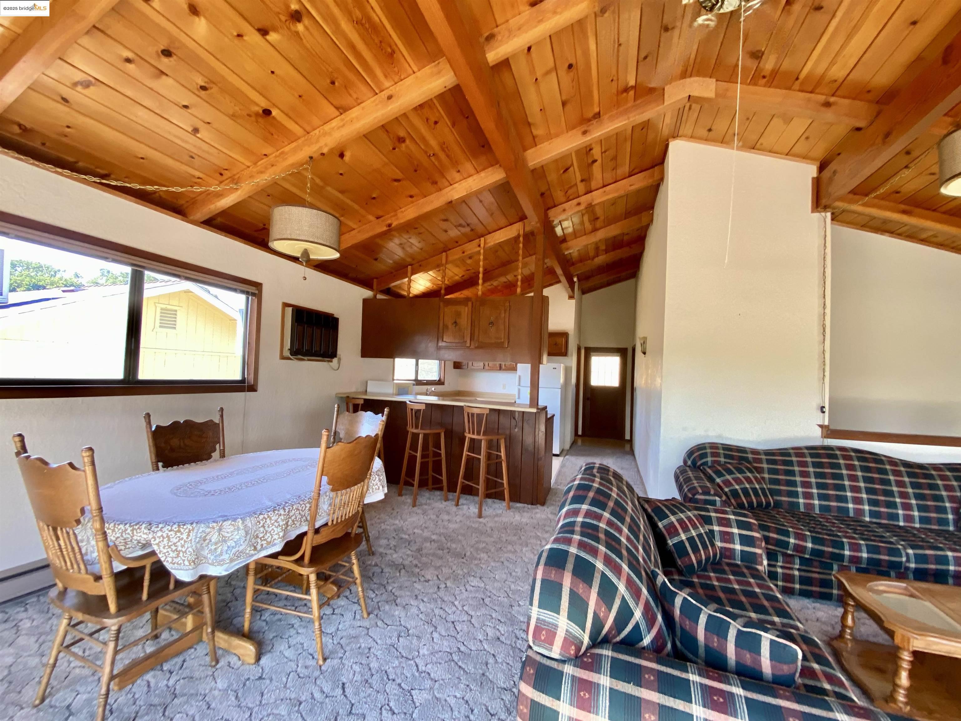 75 Poker Flat Road Copperopolis, CA 95228 - Photo 28 of 50 a view of a dining room with furniture and chandelier