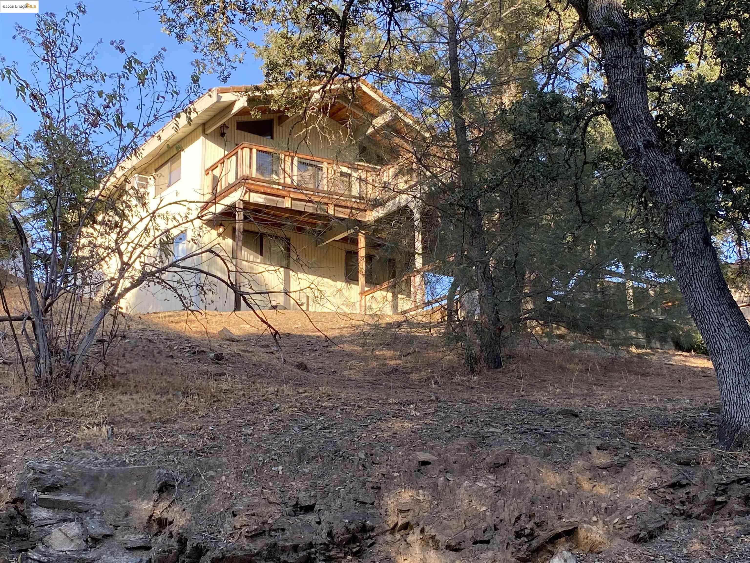 75 Poker Flat Road Copperopolis, CA 95228 - Photo 3 of 50 a view of a house with a yard