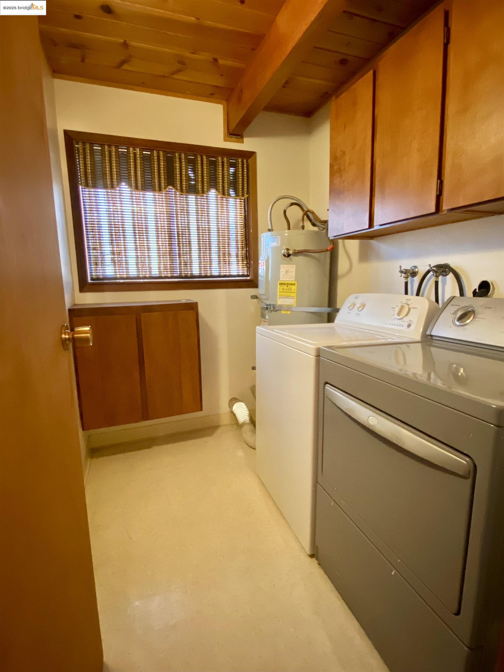 75 Poker Flat Road Copperopolis, CA 95228 - Photo 33 of 50 a utility room with dryer and washer