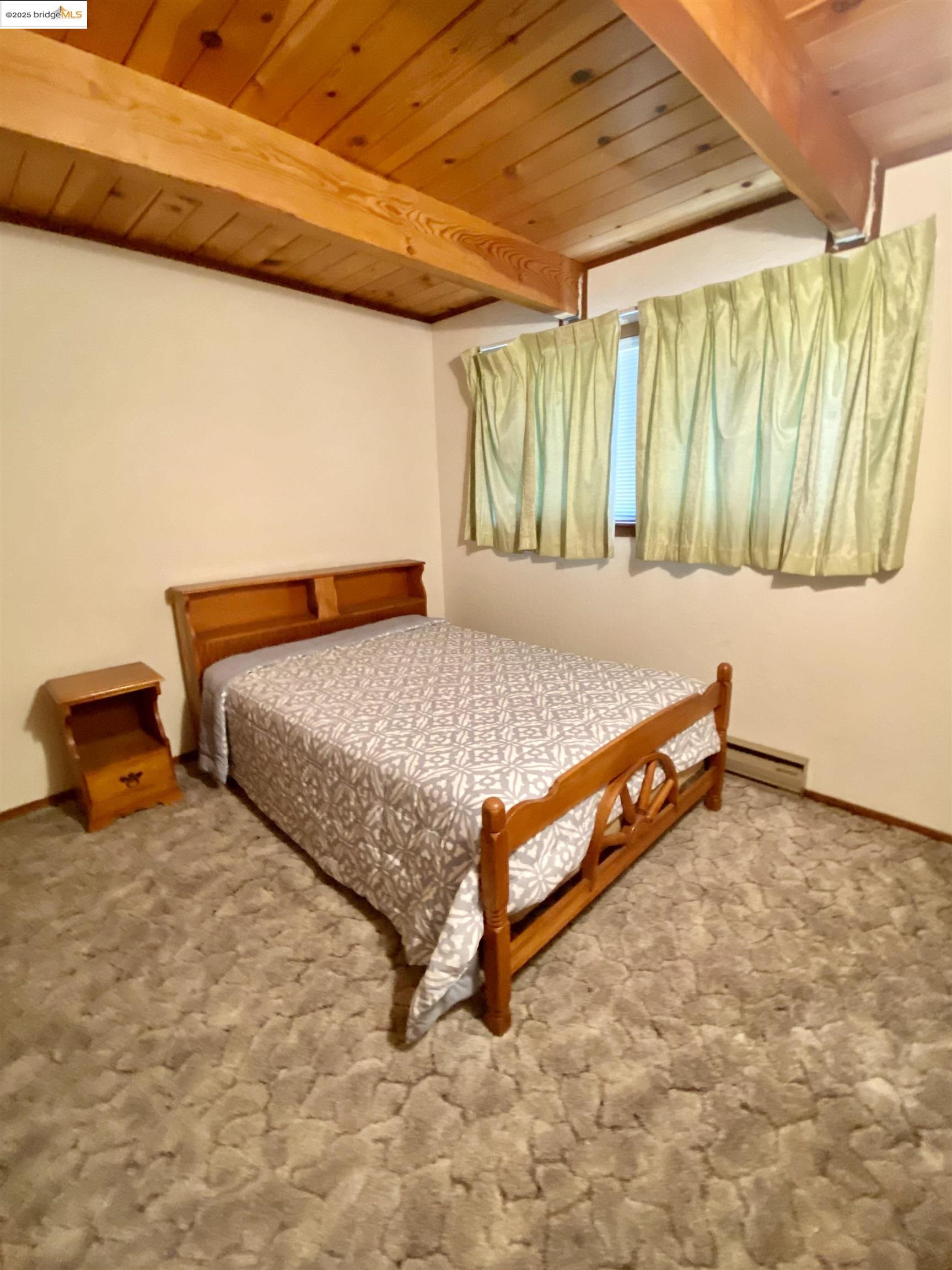 75 Poker Flat Road Copperopolis, CA 95228 - Photo 35 of 50 a bedroom with a bed and a dresser