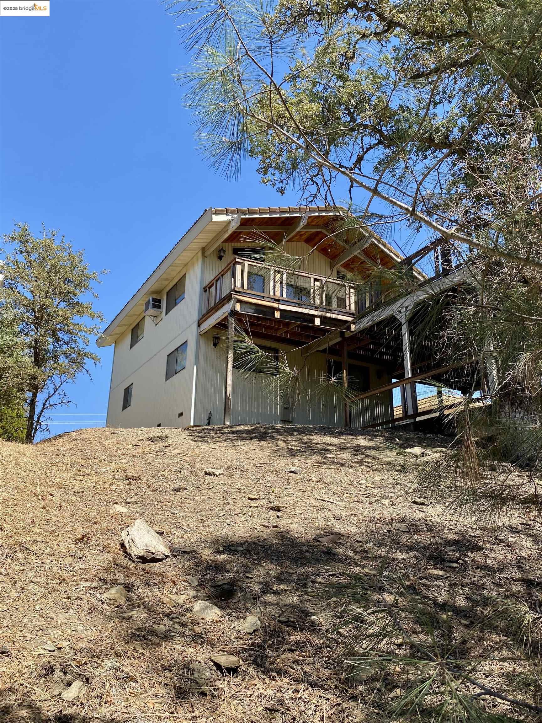 75 Poker Flat Road Copperopolis, CA 95228 - Photo 38 of 50 a front view of a house with a yard