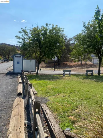 a view of a garden with an outdoor space