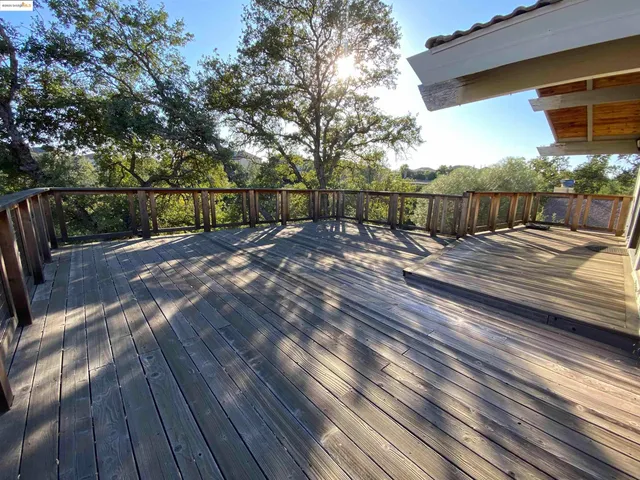 a view of backyard with wooden floor