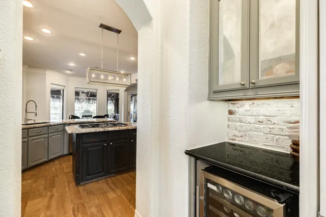 a spacious bedroom with a bed and a table