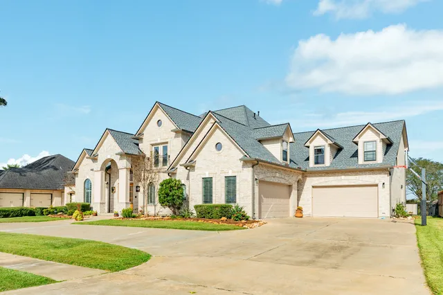 a view of a house with swimming pool