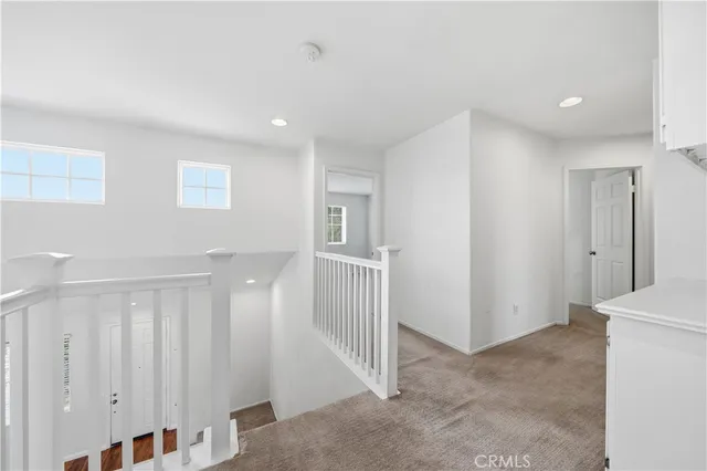 a view of a hallway with entryway