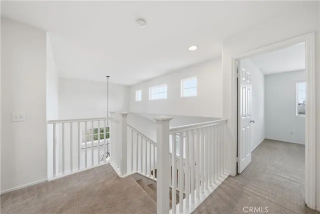 a view of a hallway with closet area