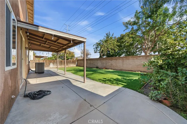 a view of backyard space and porch